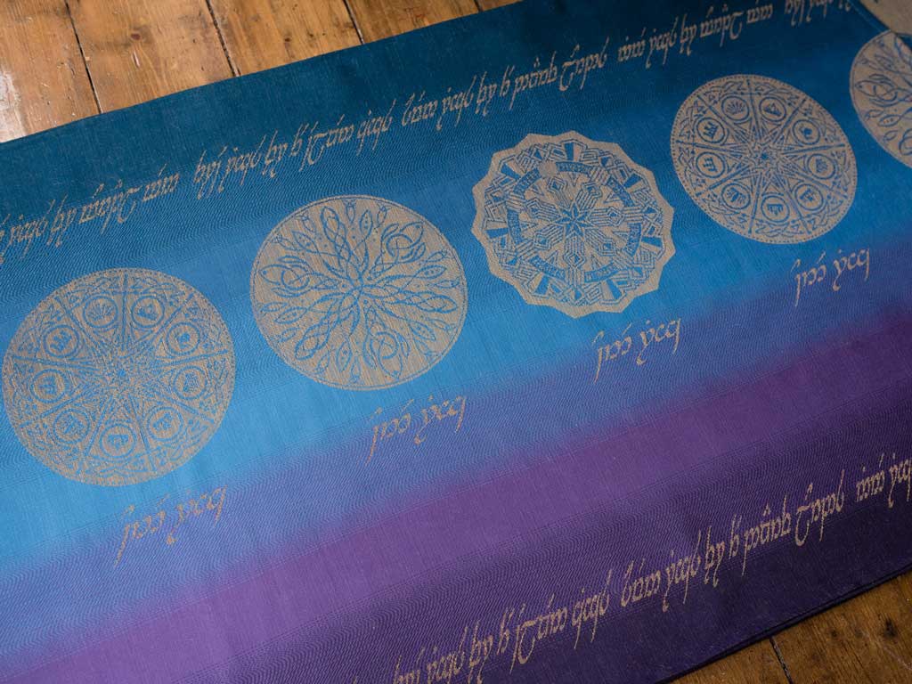 Rings of Power design on a fade of blues and purples
