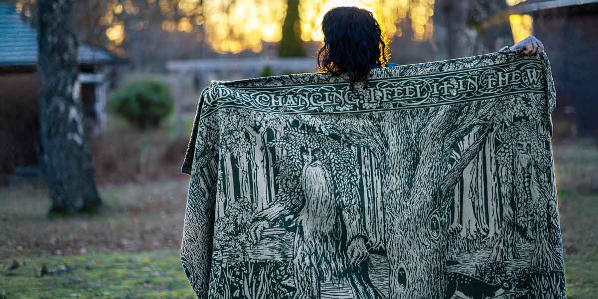 Treebeard ent design on a throw in green