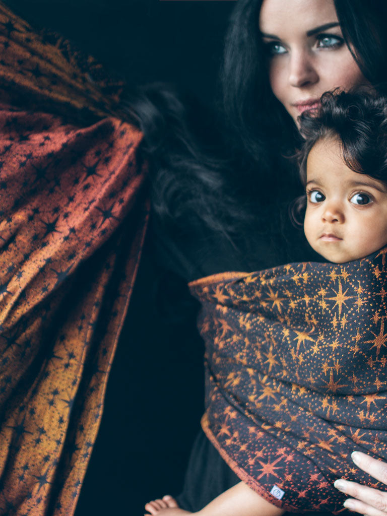 Candlelight grad - starry design baby wrap in oranges and black