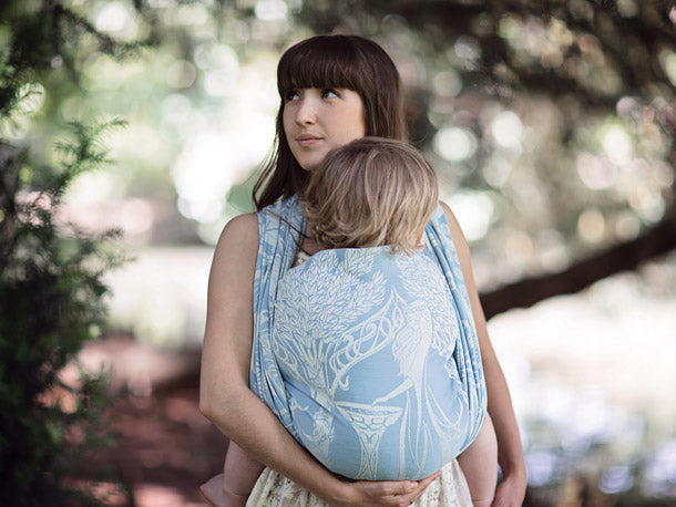 Oscha Galadriel pattern on a blue baby wrap carrier
