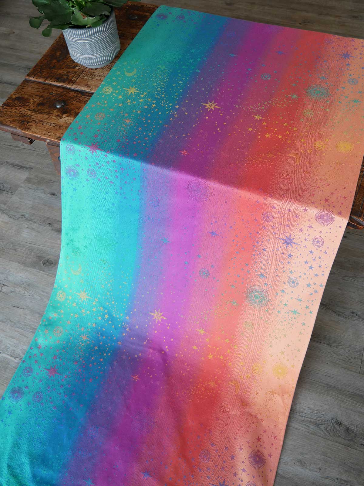 Colorful star-patterned fabric on a wooden table