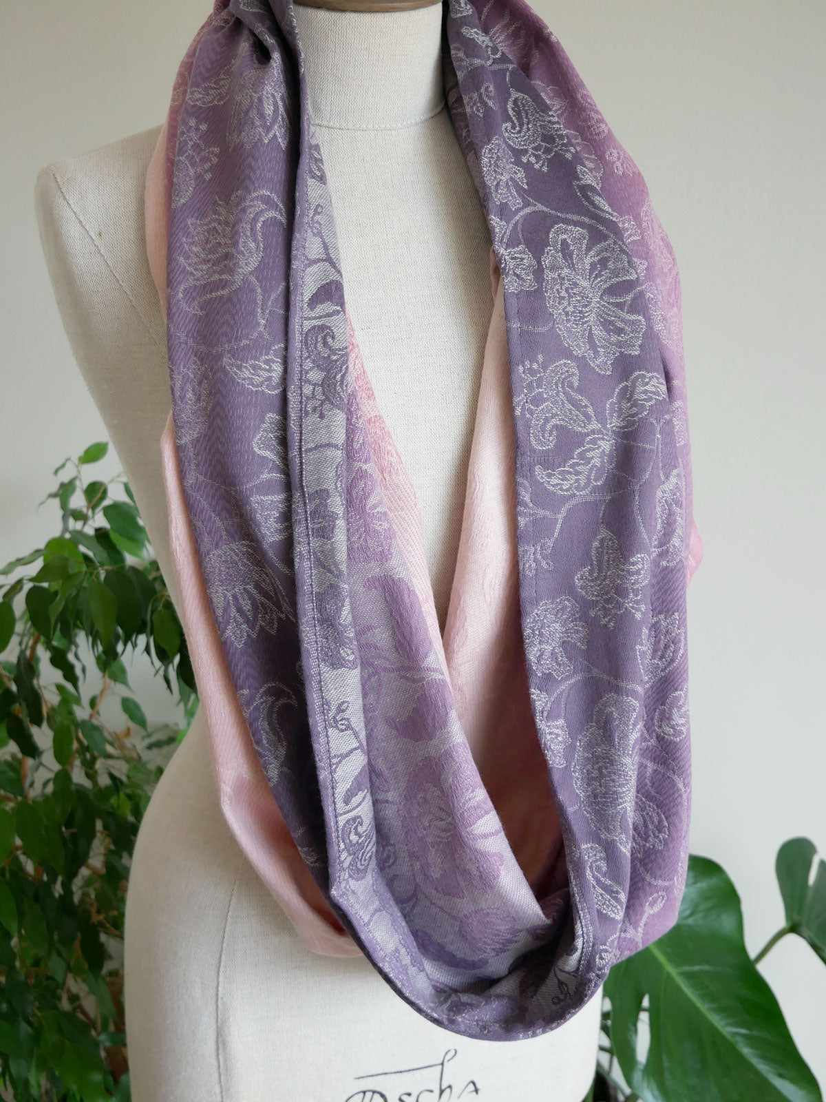 Pink and purple infinity loop on a mannequin