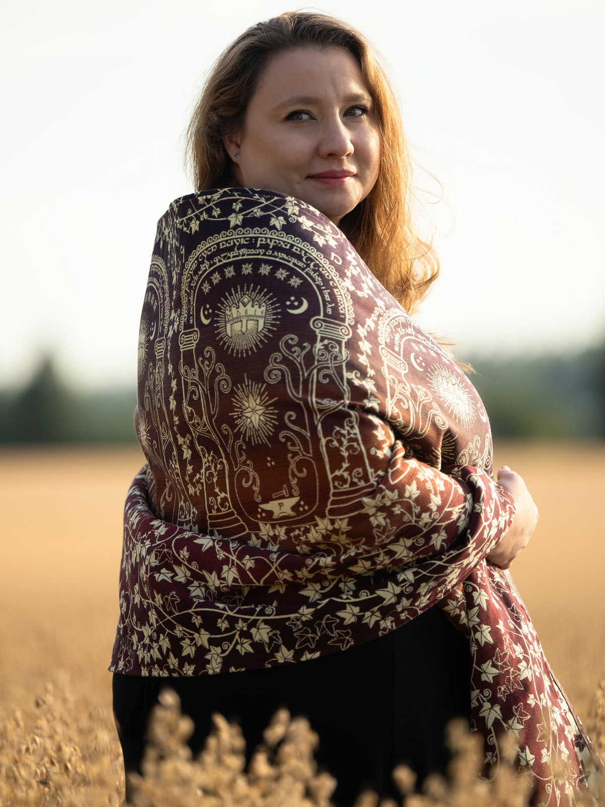 Woman wearing Doors of Durin Ornament Shawl in a field