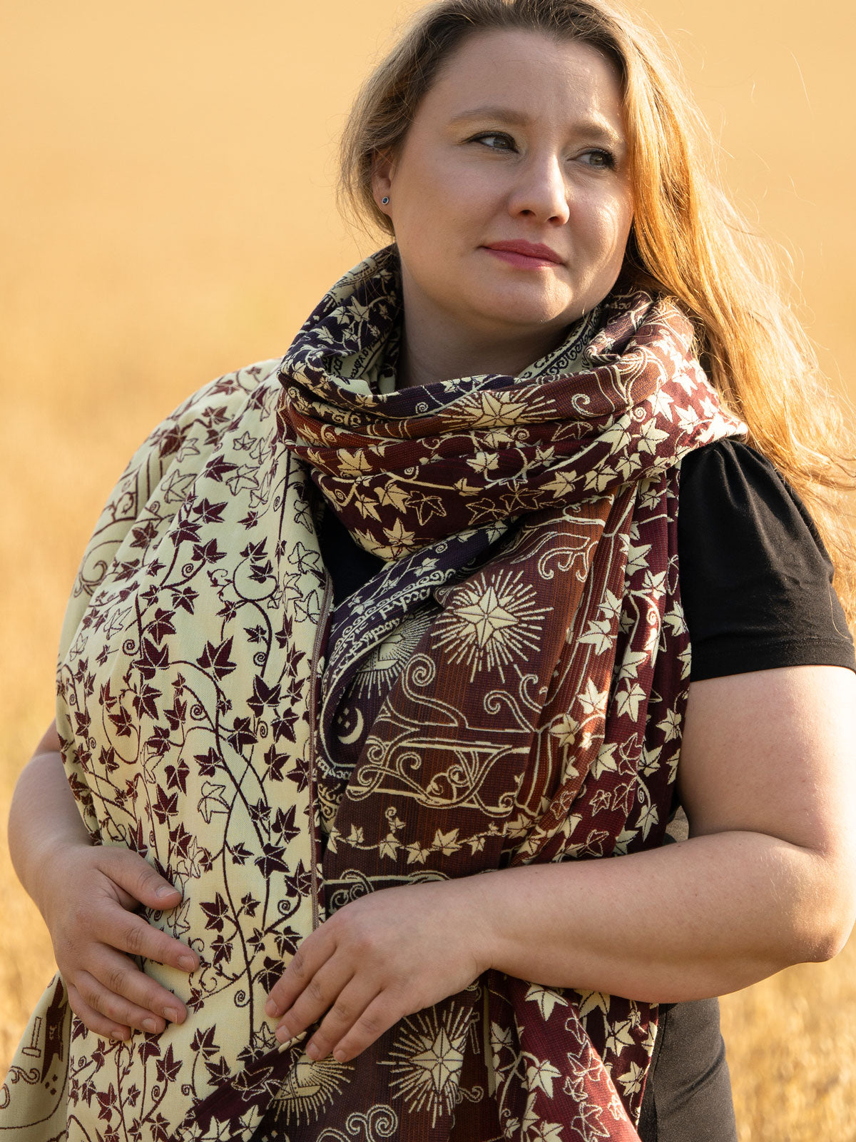 Woman wearing a patterned scarf against a beige background