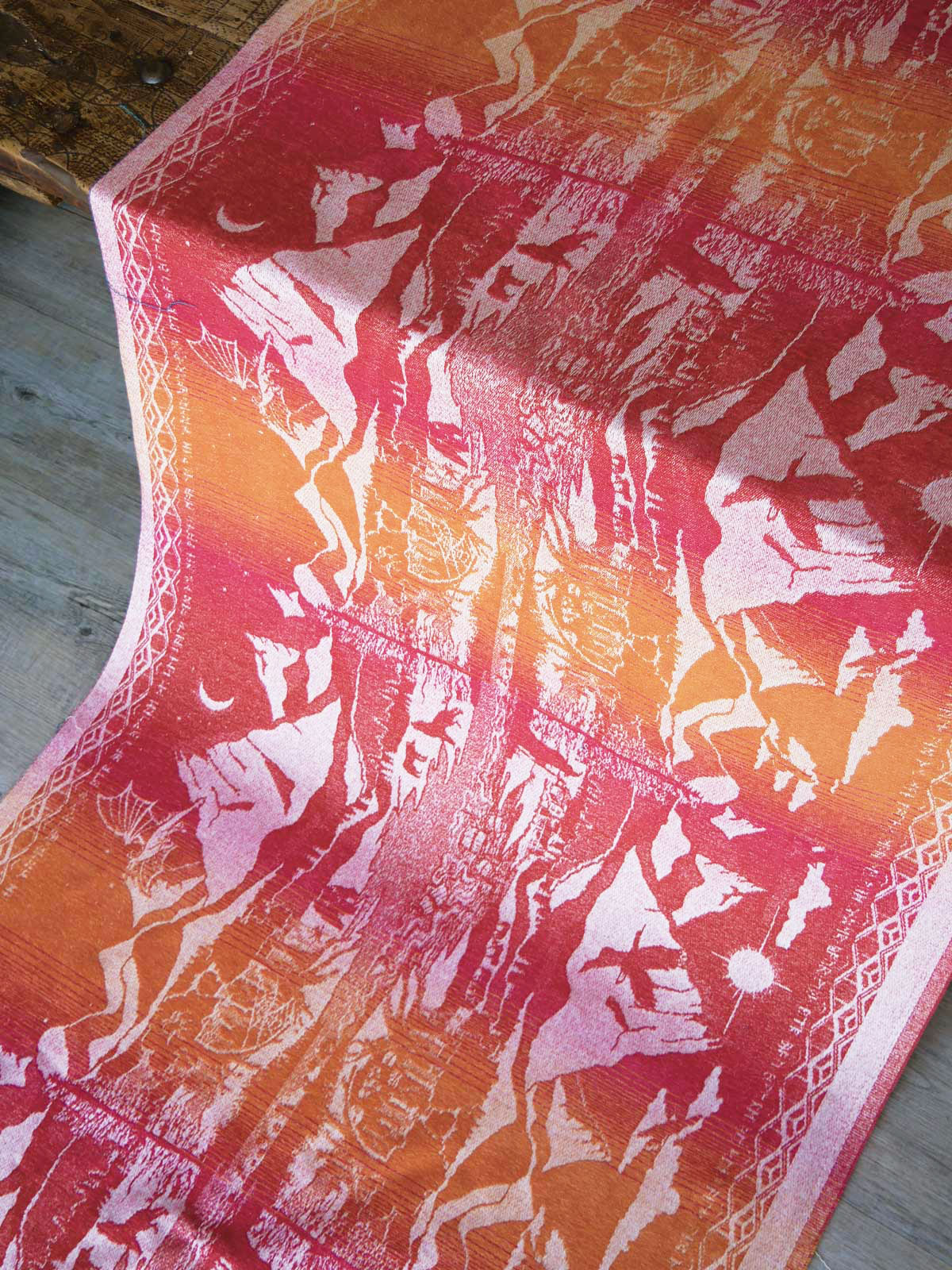 Middle-earth baby wrap carrier in Hobbit Quest design.