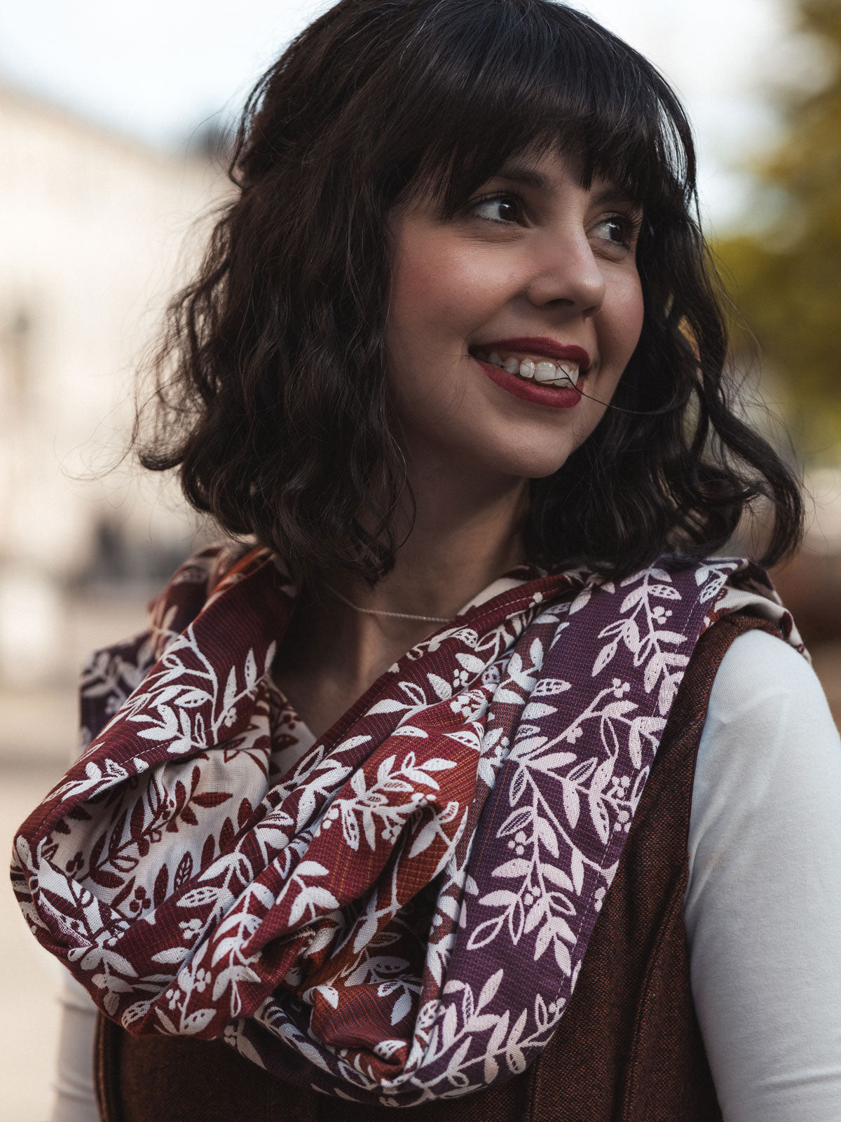 Woman wearing a patterned scarf outdoors