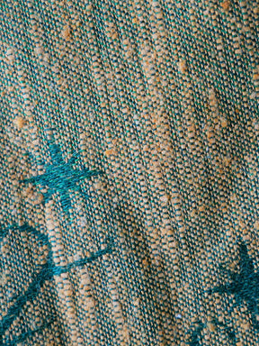 Close-up of textured fabric with star patterns