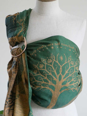 Green ring sling with tree design on a mannequin