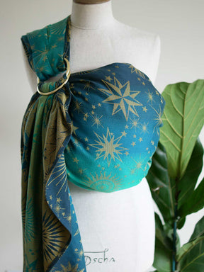 A teal ring sling with starry pattern on a mannequin