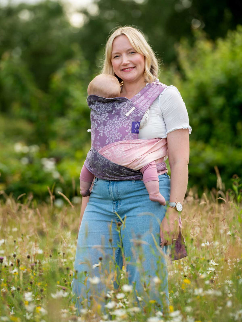 Cairis baby carrier showing beautiful purple and pink grad fabric. 