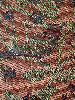 Close-up of a textured fabric with floral pattern