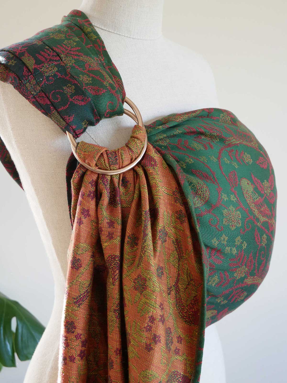 Decorative ring sling on a mannequin against a white background