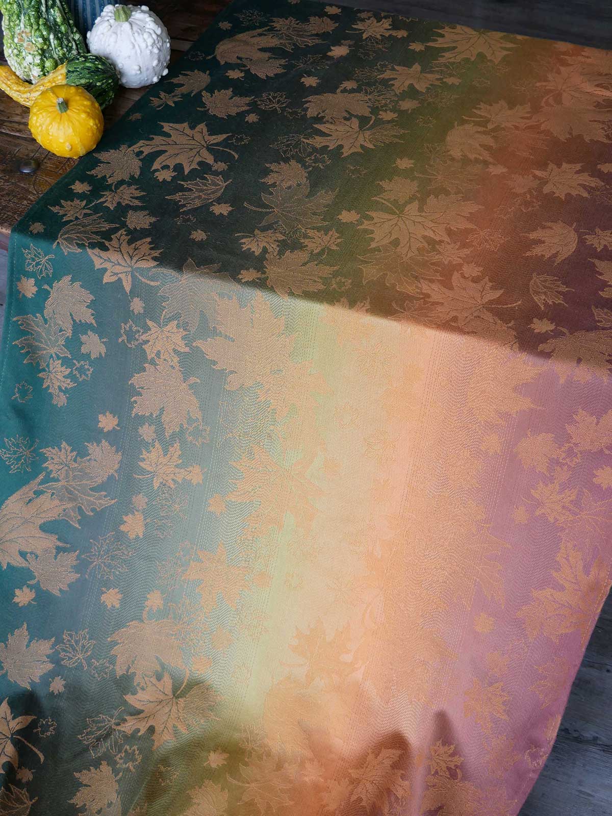 Baby Wrap with leaf pattern on a table