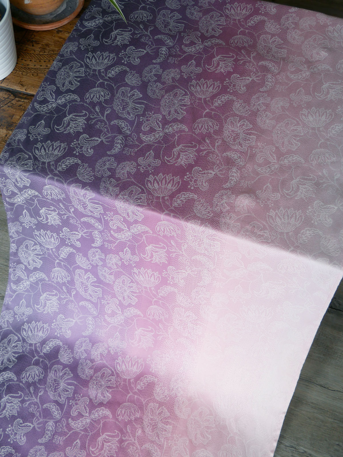 Pink and purple fabric with flower design