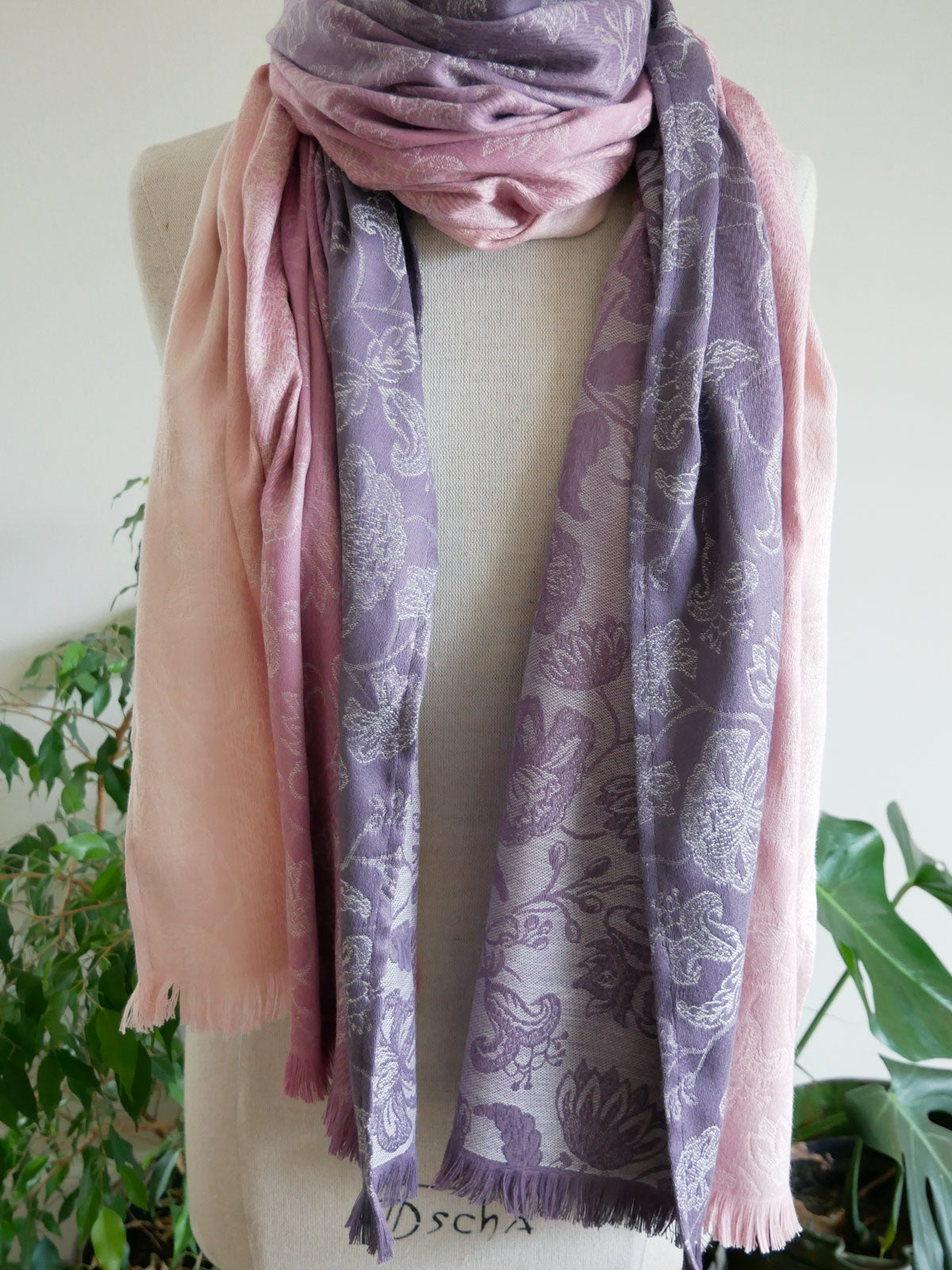 Pink and purple scarf on a mannequin