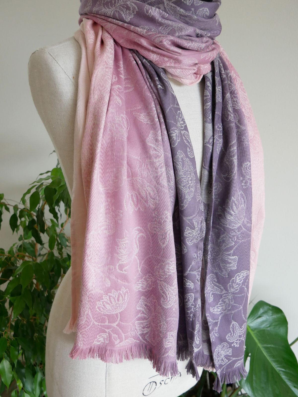 Pink and purple scarf on a mannequin