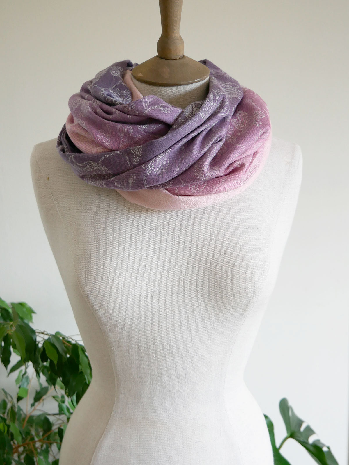 Pink and purple infinity loop on a mannequin
