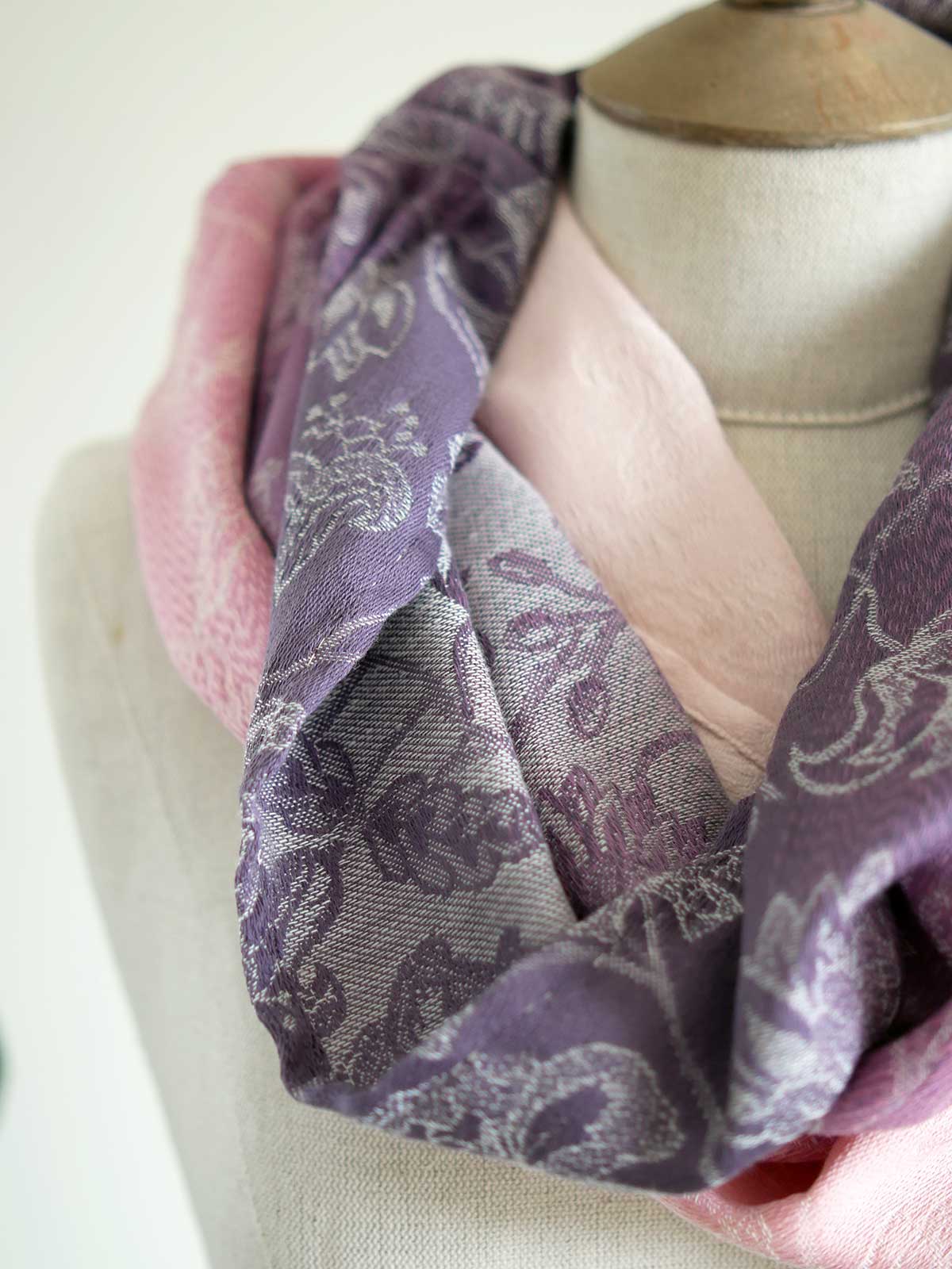 Pink and purple cowl on a mannequin