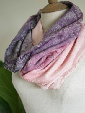 Pink and purple cowl on a mannequin