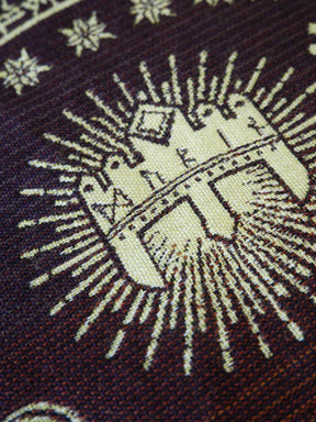 Close-up of a woven pattern with geometric design on fabric