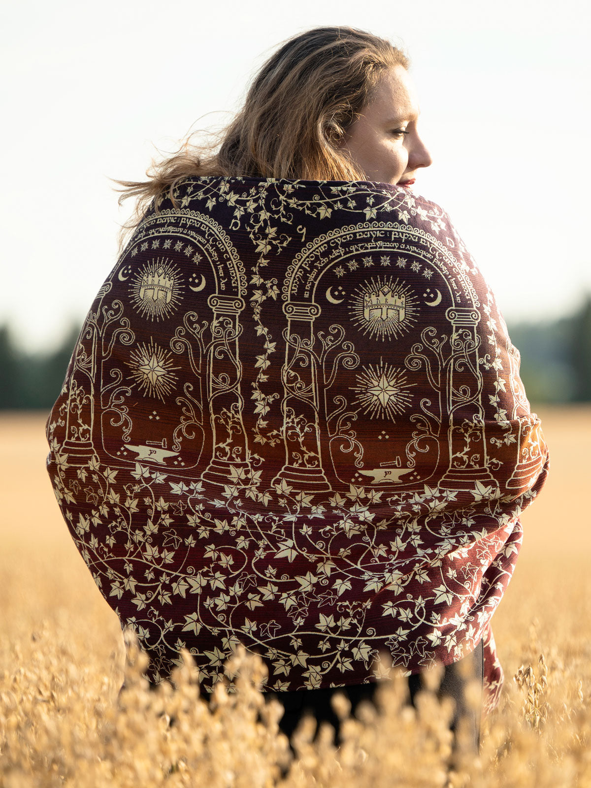 Woman wearing Doors of Durin Ornament Shawl in a field