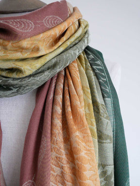 Autumnal fabric on a mannequin with a white background