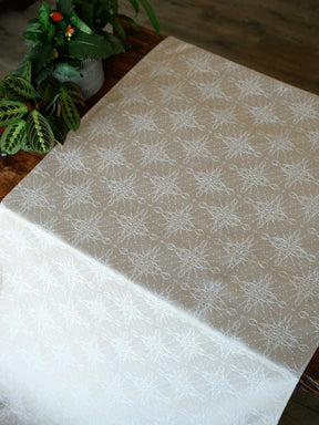 Fabric with intricate pattern on a wooden chest