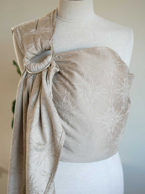 Ring sling on a mannequin with a neutral background