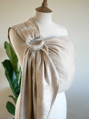 Ring sling on a mannequin with a neutral background