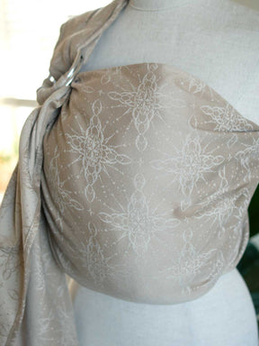 Ring sling on a mannequin with a neutral background