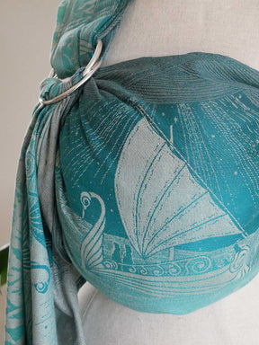 Teal ring sling with sailboat design on a mannequin