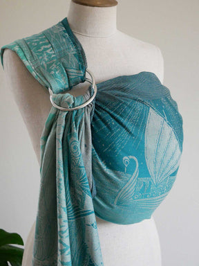 Teal ring sling with Middle-earth design on a mannequin against a white background