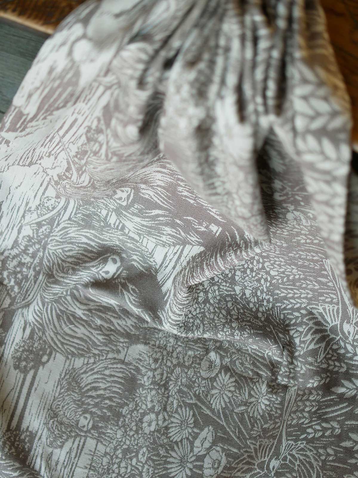 Textured fabric with highland cows and floral pattern