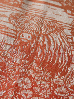 Close up of a fabric with Highland cow pattern