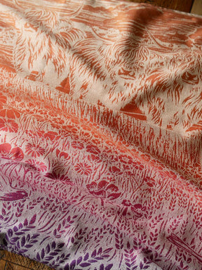 Reverse side of a colourful fabric with Highland cow pattern