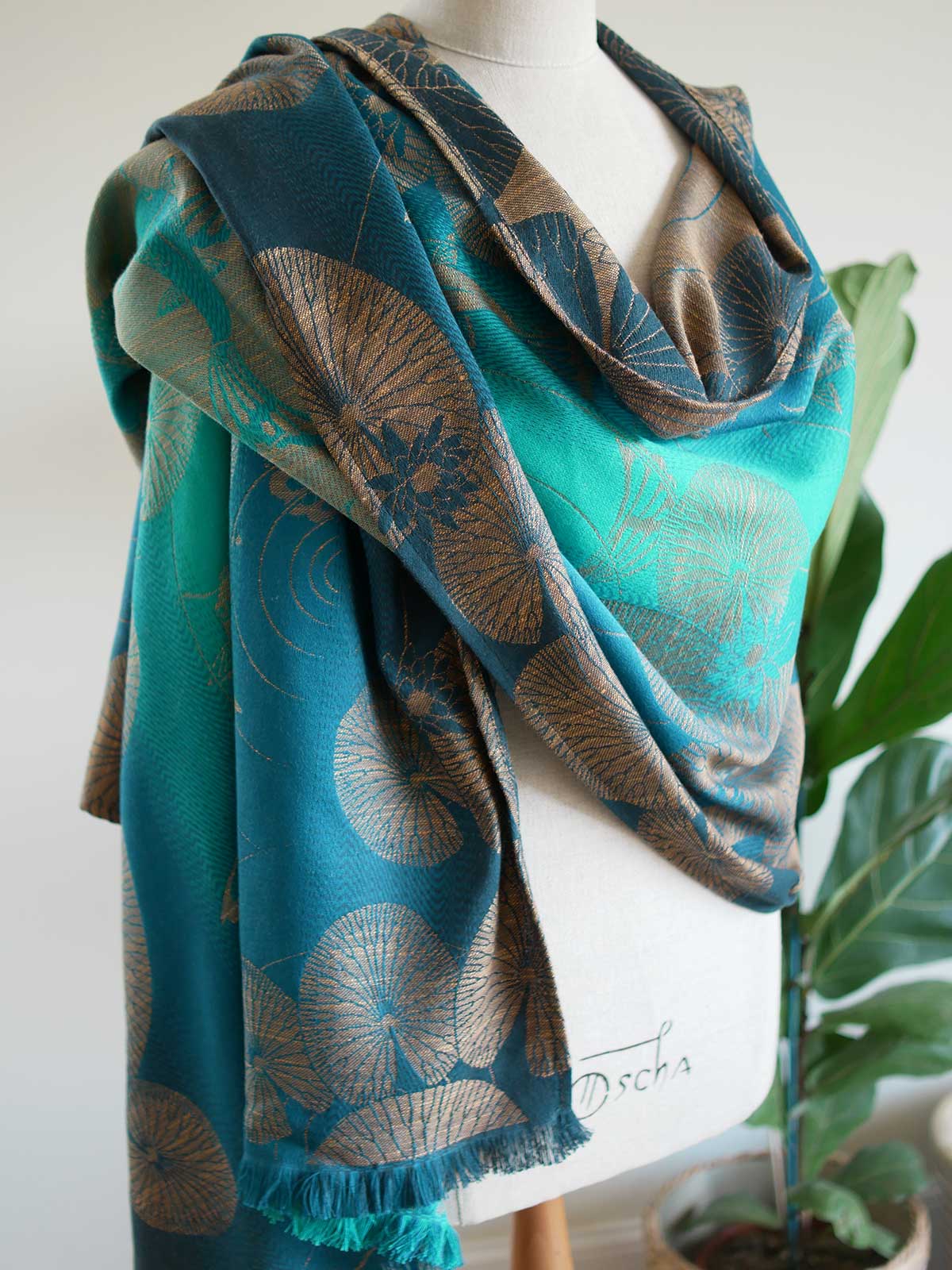 SIde view of Koi Moire scarf in teal
