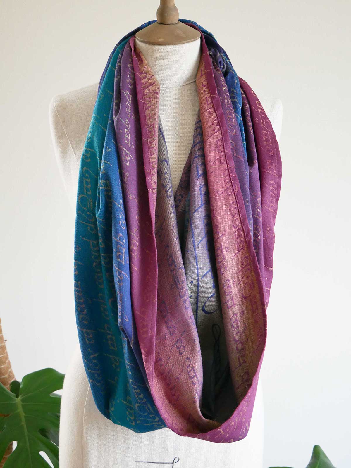 Multicolored scarf on a mannequin against a white background