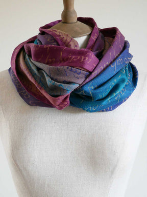 Multicolored scarf on a mannequin against a white background