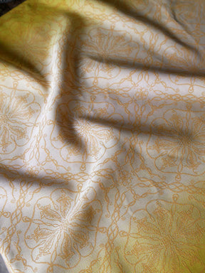 Fabric laid out with a few waves to show texture. 