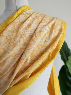 View of the back of the ring sling on mannequin. Shows the pattern and colour graduation. 