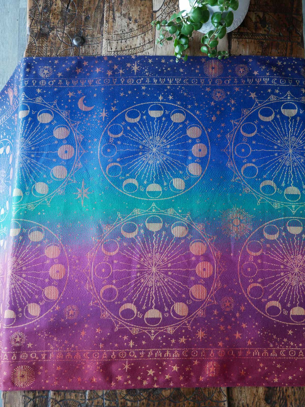 Jewel toned fabric with moon phases pattern