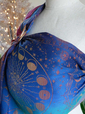 Ring sling with celestial designs on a mannequin