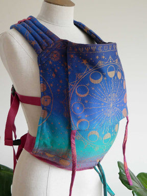 Jewel coloured backpack with celestial design on a mannequin