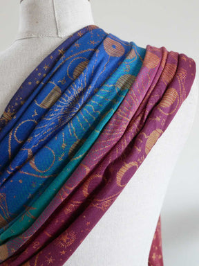 Colourful fabric with intricate patterns on a mannequin.