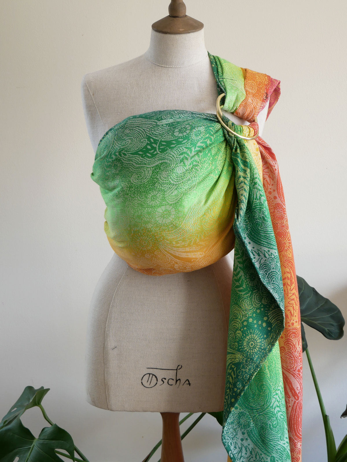 Colourful Marina Starburst Ring Sling draped over a mannequin with a white background