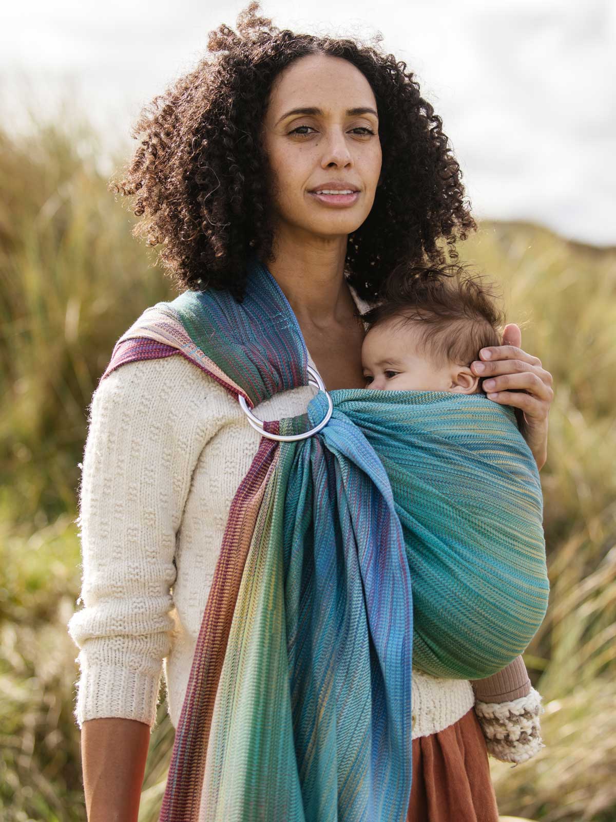 Matrix Chromatic RIng Sling with small baby outside in Cornwall