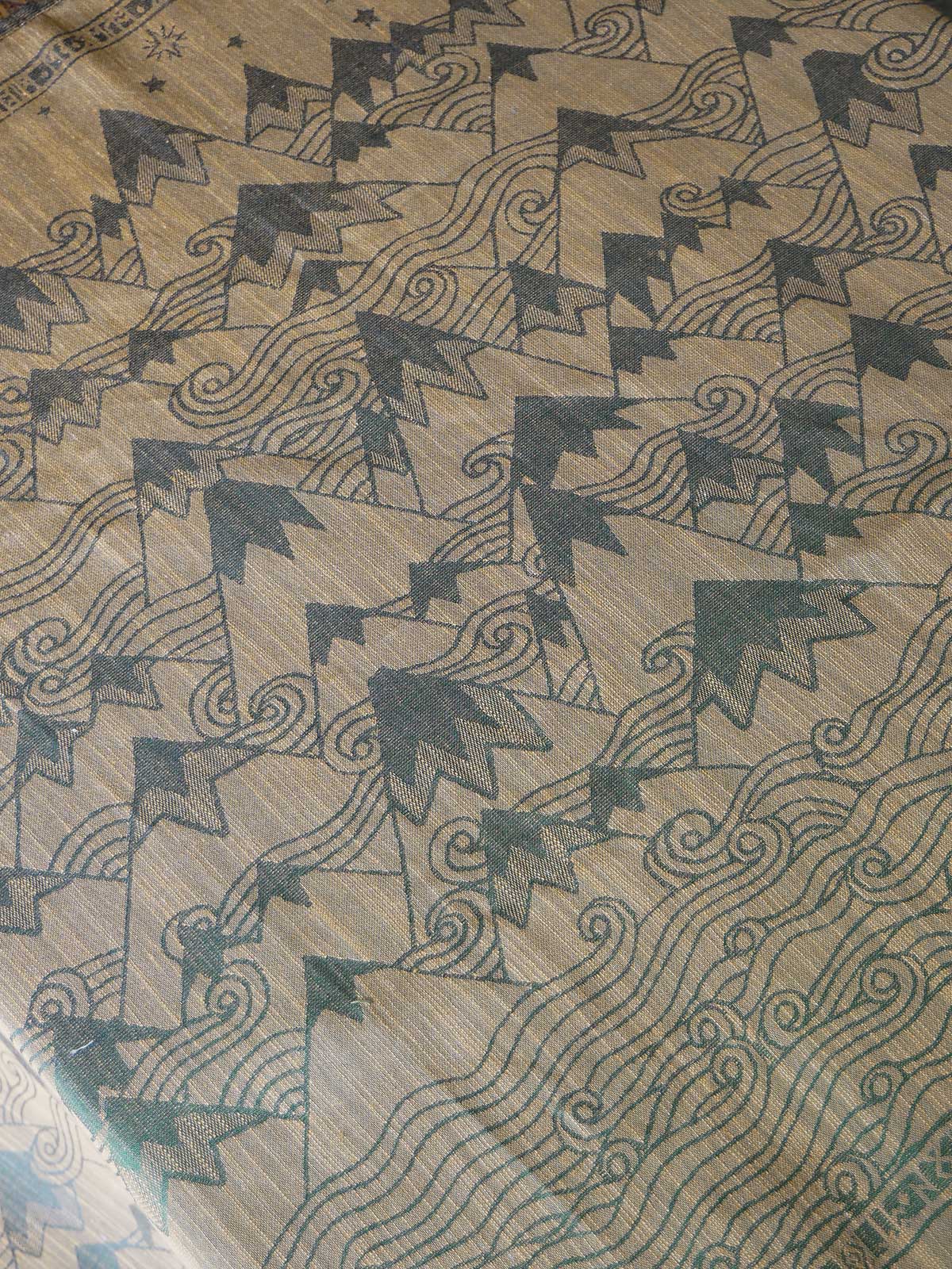 Textile with Mountain pattern on a gold background