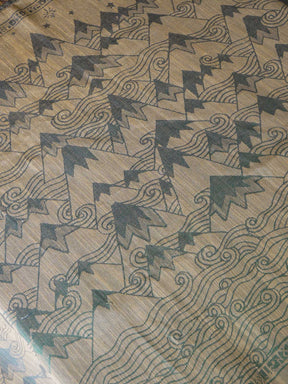 Textile with Mountain pattern on a gold background