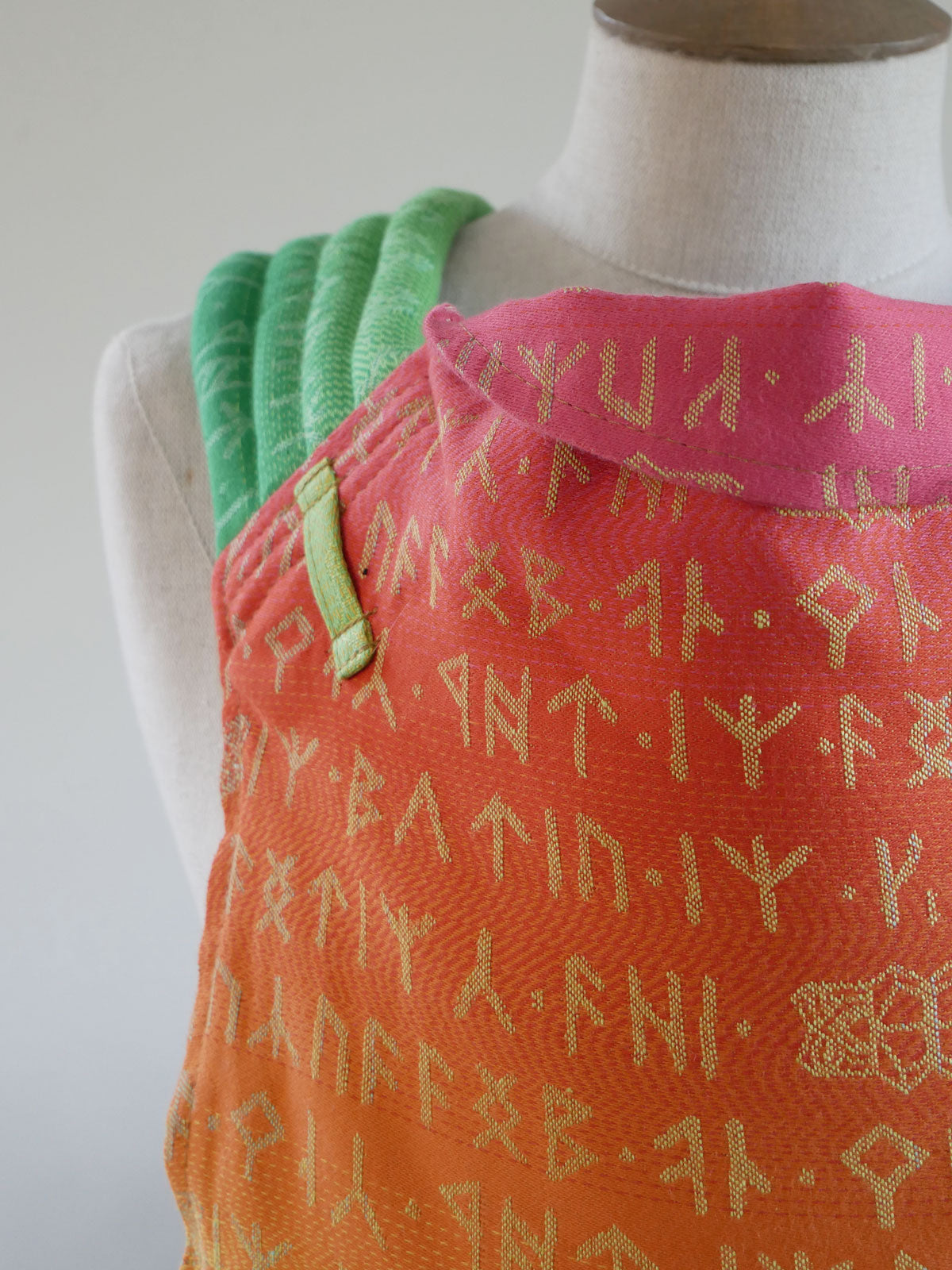 Moria Citrus Cairis Baby Carrier on mannequin