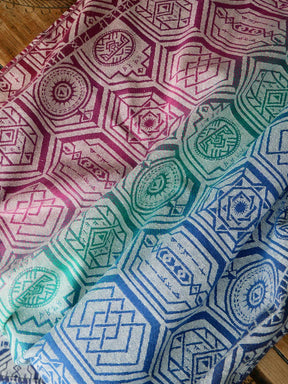 Reverse of a fabric with geometric pattern on a wooden table 